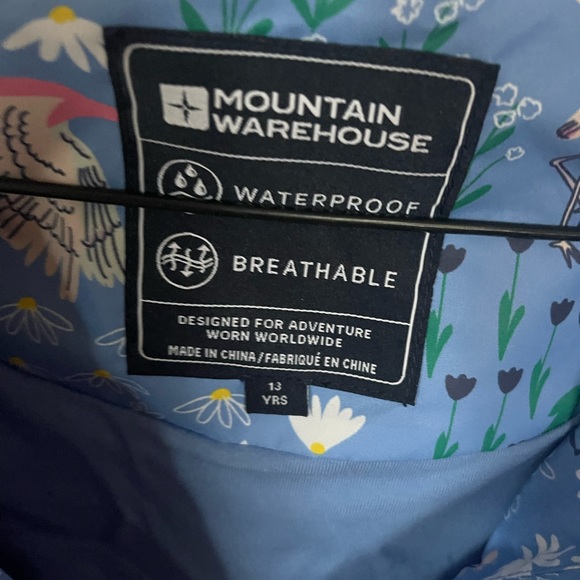 Brand new rain coat in size 13 years old girl - Picture 2 of 2